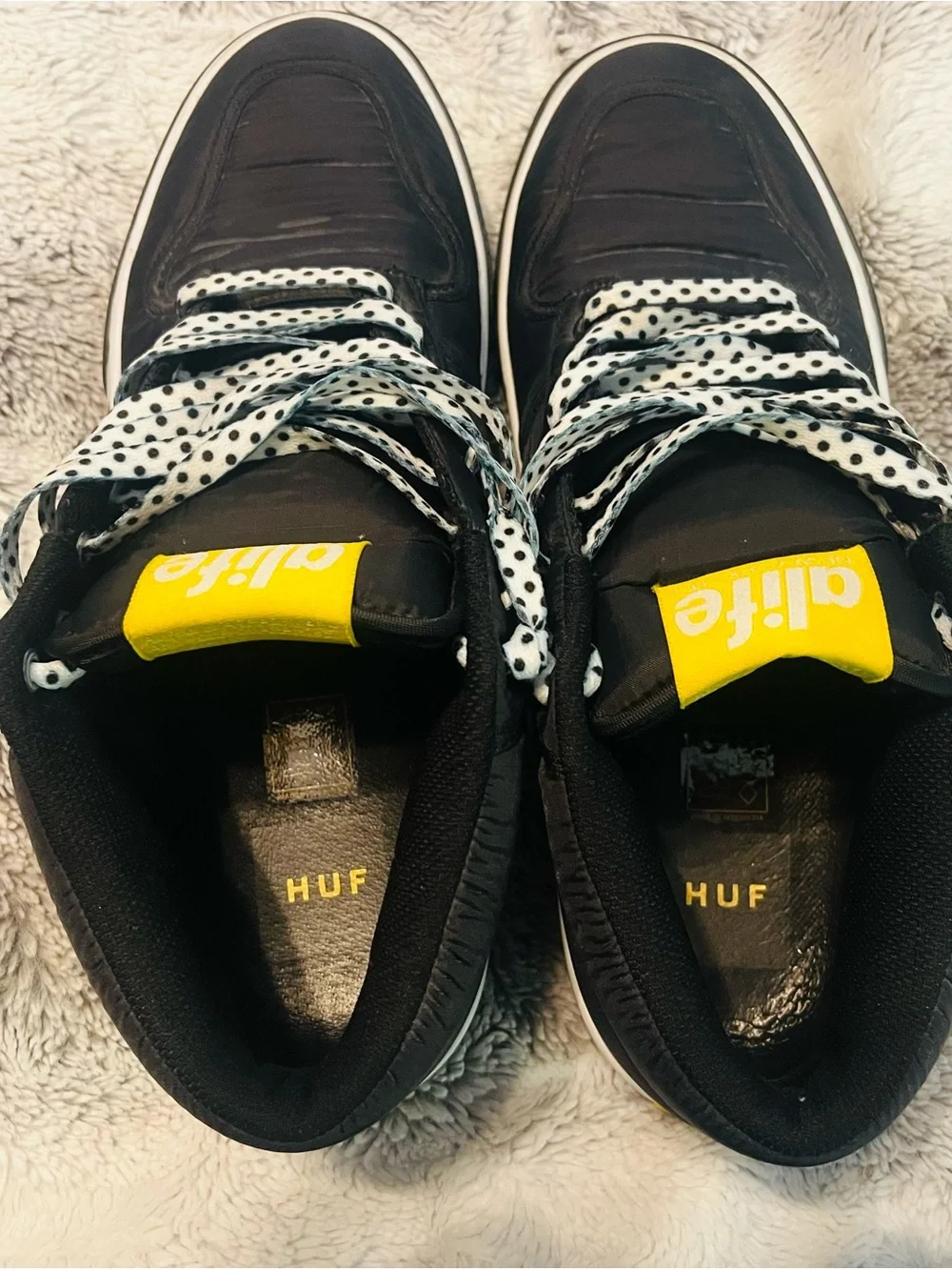 Alife Black High-Top Sneakers with Yellow Logo and White Polka Dot Laces